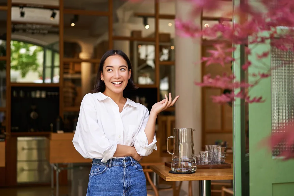 Smiling small business owner in a shop